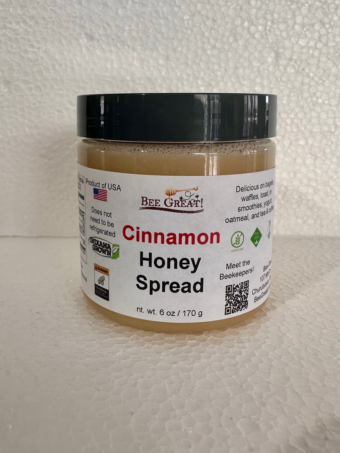 bee great cinnamon honey spread (creamed honey) in a plastic jar with black screw cap
