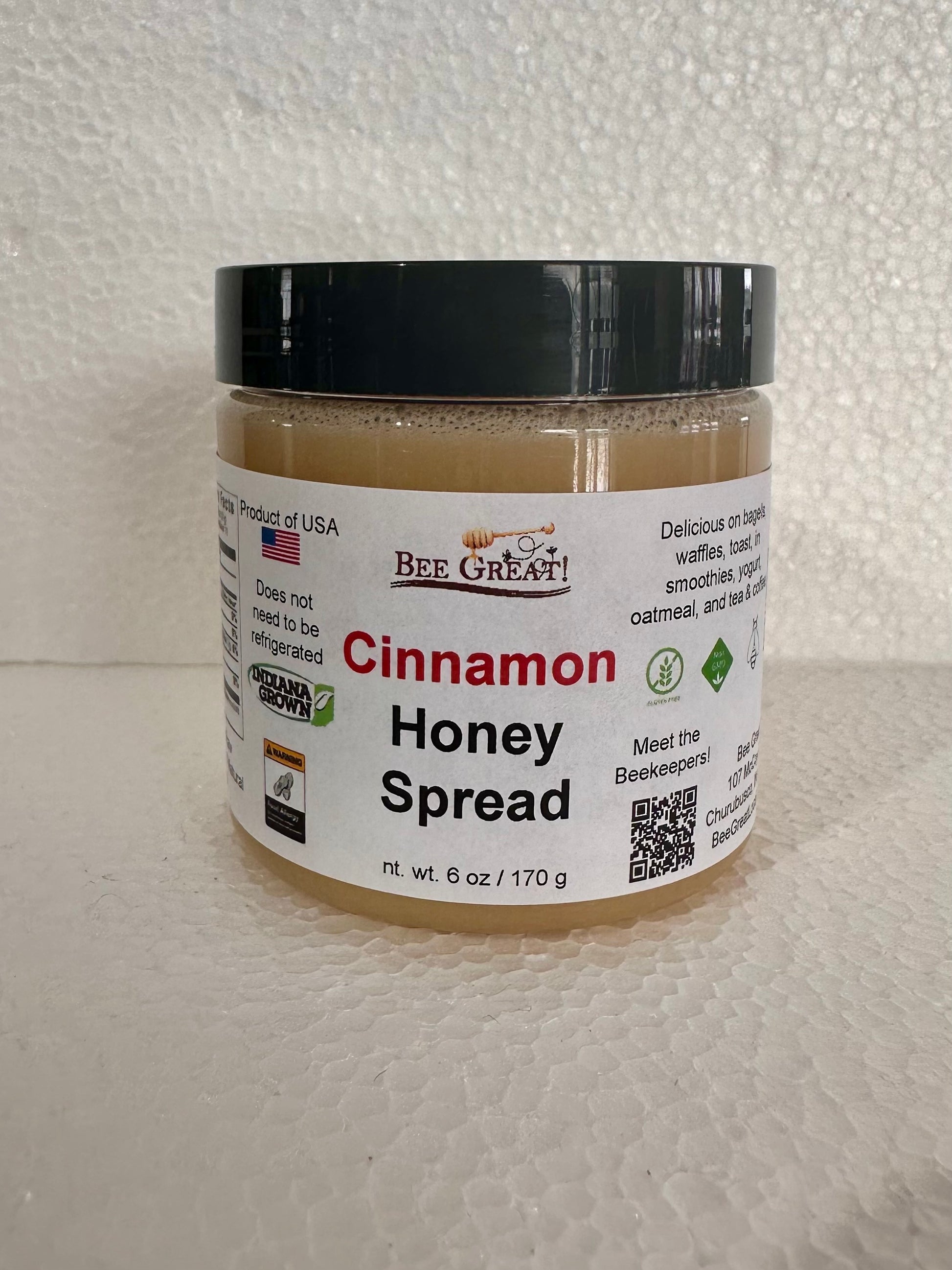 bee great cinnamon honey spread (creamed honey) in a plastic jar with black screw cap
