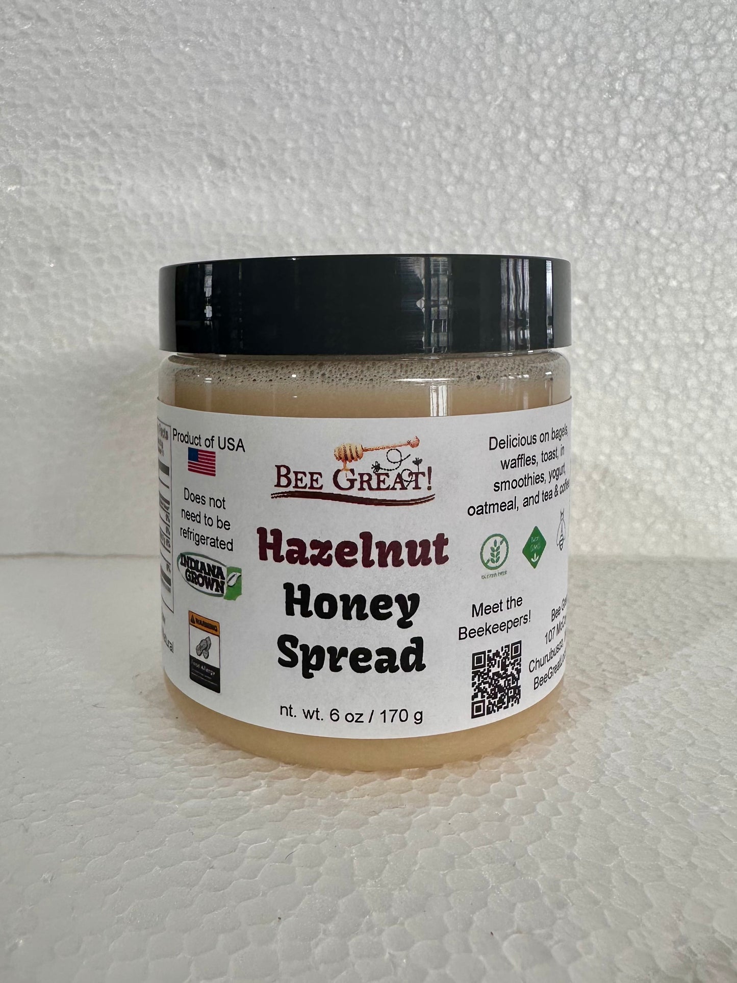 bee great hazelnut honey spread (creamed honey) in a plastic jar with black screw cap