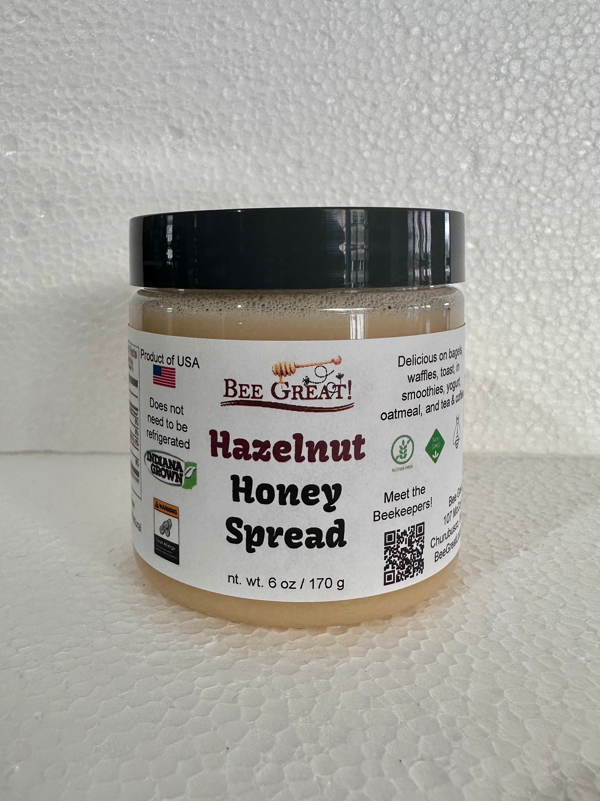 bee great hazelnut honey spread (creamed honey) in a plastic jar with black screw cap